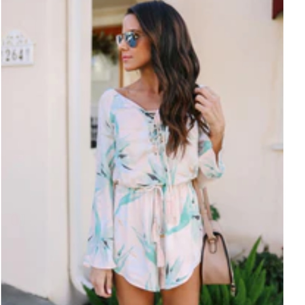Vici romper NEW with tags. Size M.
